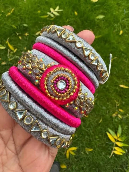 Pink and grey thread bangles