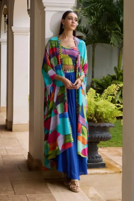 Navy blue skirt with a multicolured long cape