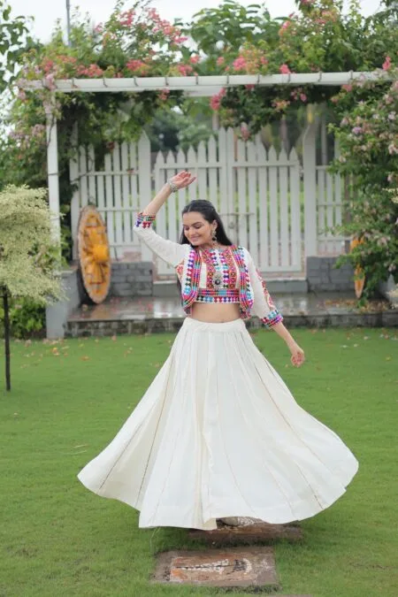 Kutchi gamthi and gota pathi work navratri lehenga choli with jacket