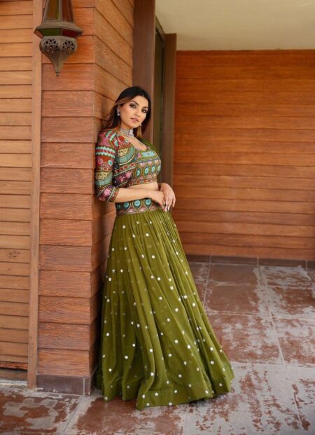 Green georgette lehenga with embroidered jacket