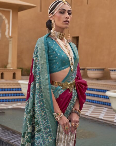 Mercerised sigma silk saree with patola design and gold print.