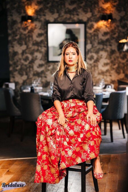 Red banarasi skirt and black shirt