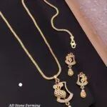 AD and red stone pendant with long chain