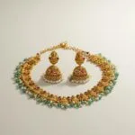 Antique Gold Temple Lakshmi Necklace Set with Jhumka Earrings – Traditional South Indian Jewellery with Pink & Mint Beads
