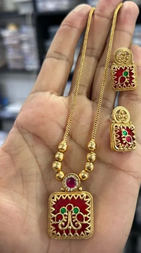 Traditional gold square pendant set