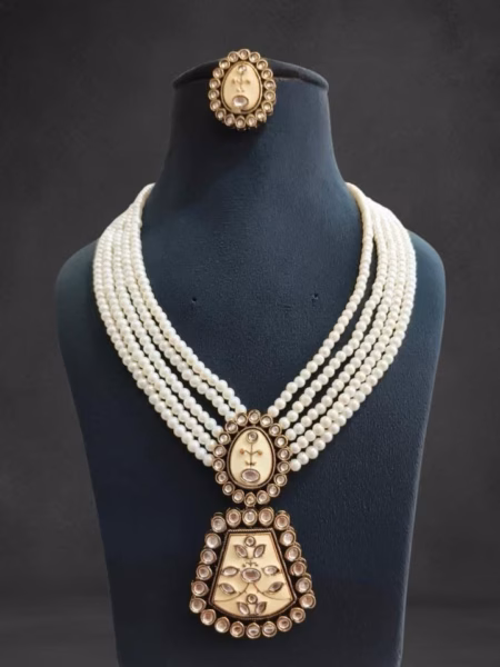 Pearl necklace set with cream meenakari work pendent